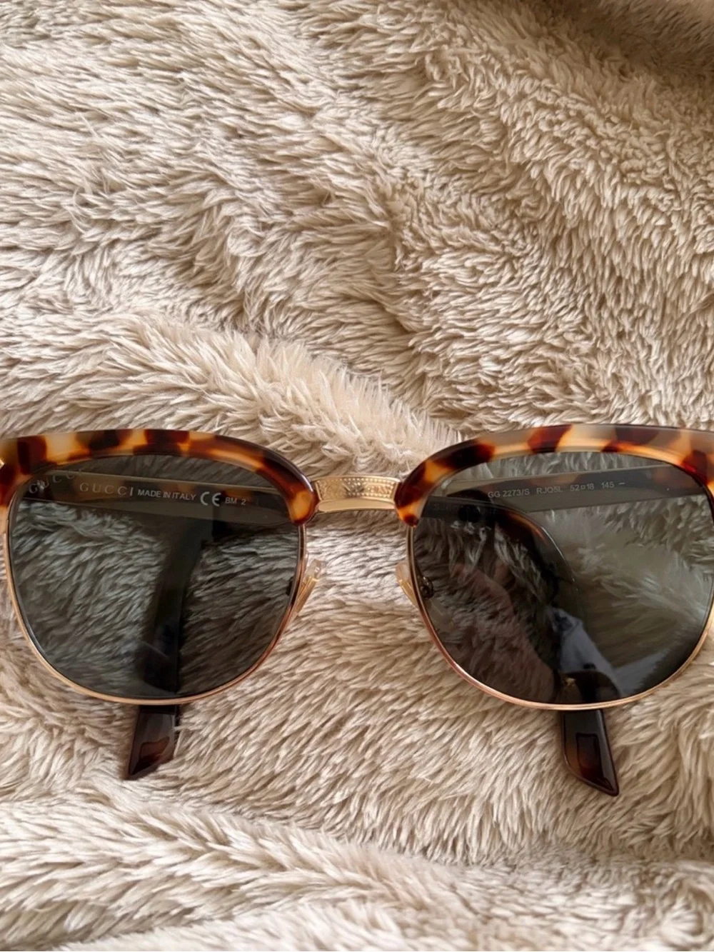Gucci Tortoiseshell Sunglasses with Gold Accents and Dark Lenses